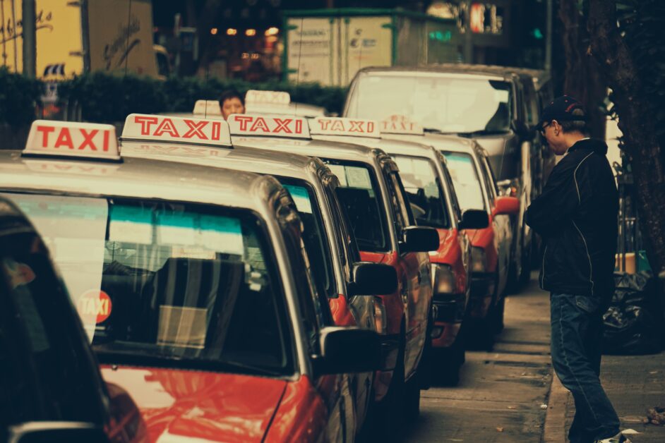 row of Hong Kong red taxis