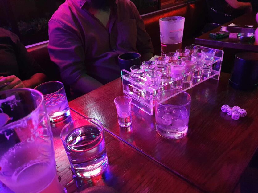 empty shots tray with beers at a bar in Hong Kong