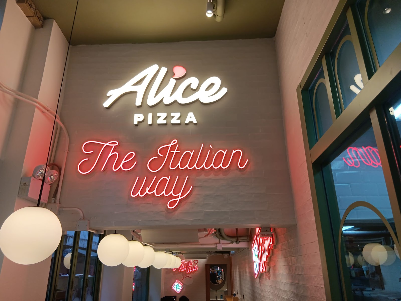 The Italian Way sign at Alice Pizza