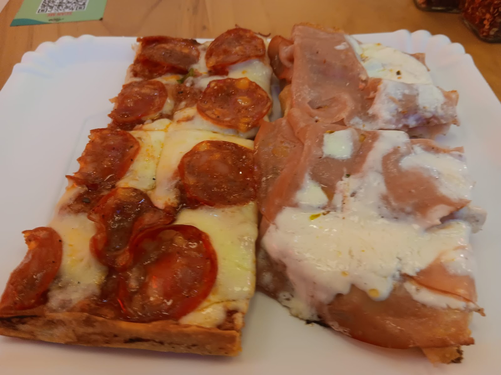 mortadella and pepperoni slices at Alice Pizza