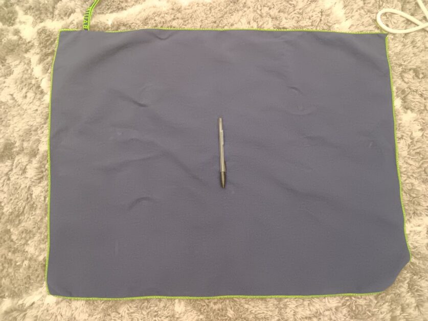 blue microfiber towel with pen for scale