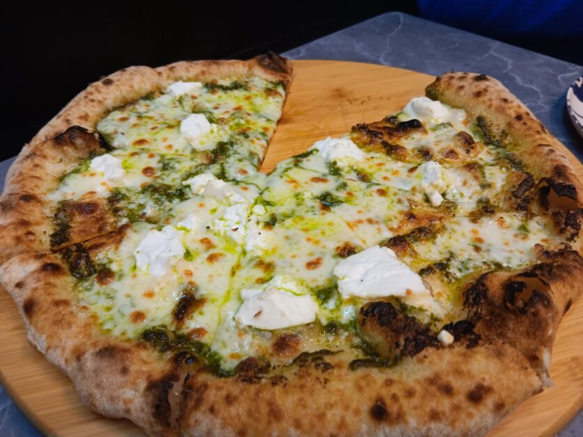 pesto and ricotta pizza at Rossi's Pizza and Smoked Meats