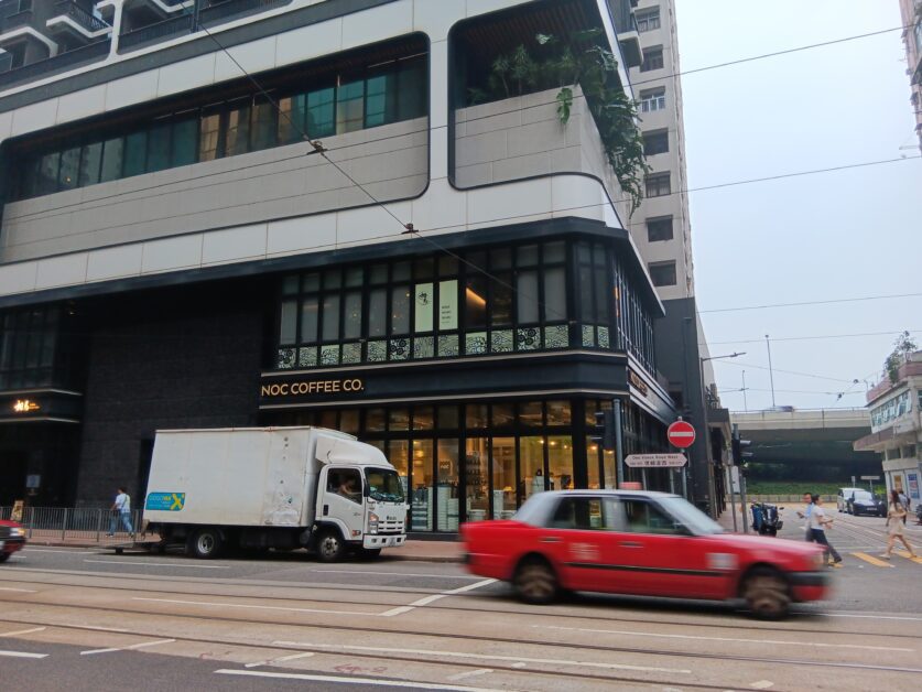 Hong Kong Red taxi in front of NOC Coffee