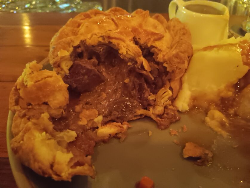 beef, beer, and mushroom pie inside at The Globe