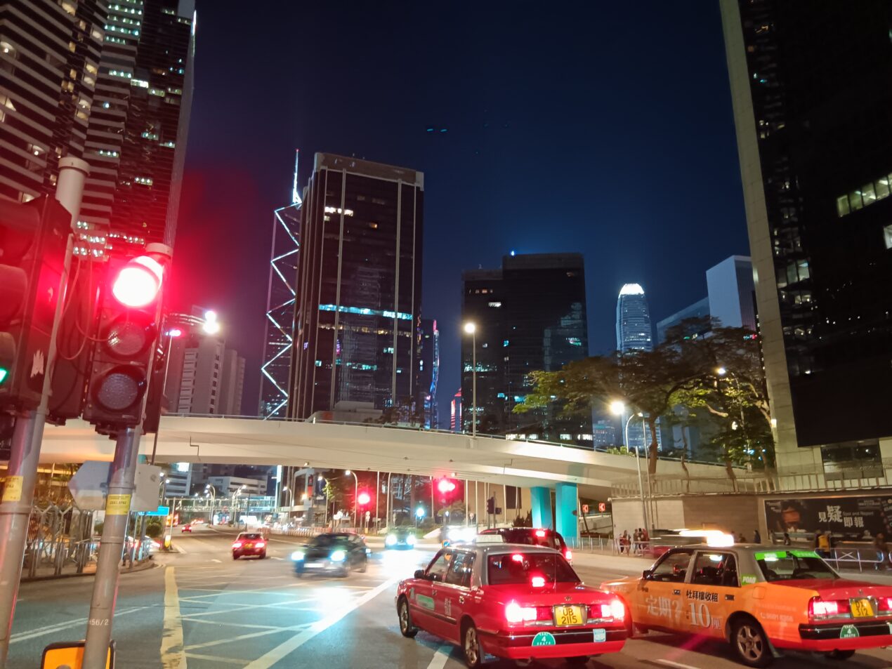 red taxi in Central Hong Kong at night