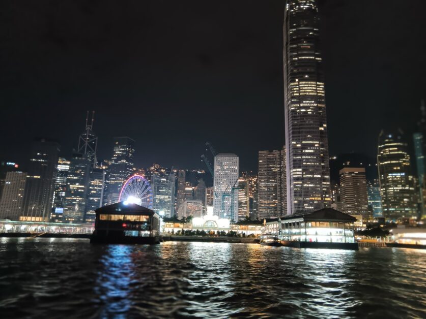 view of IFC at night from the Star Ferry